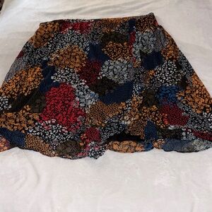 Maurices Black Floral Patchwork Skater Skirt with Red and Mustard Accents